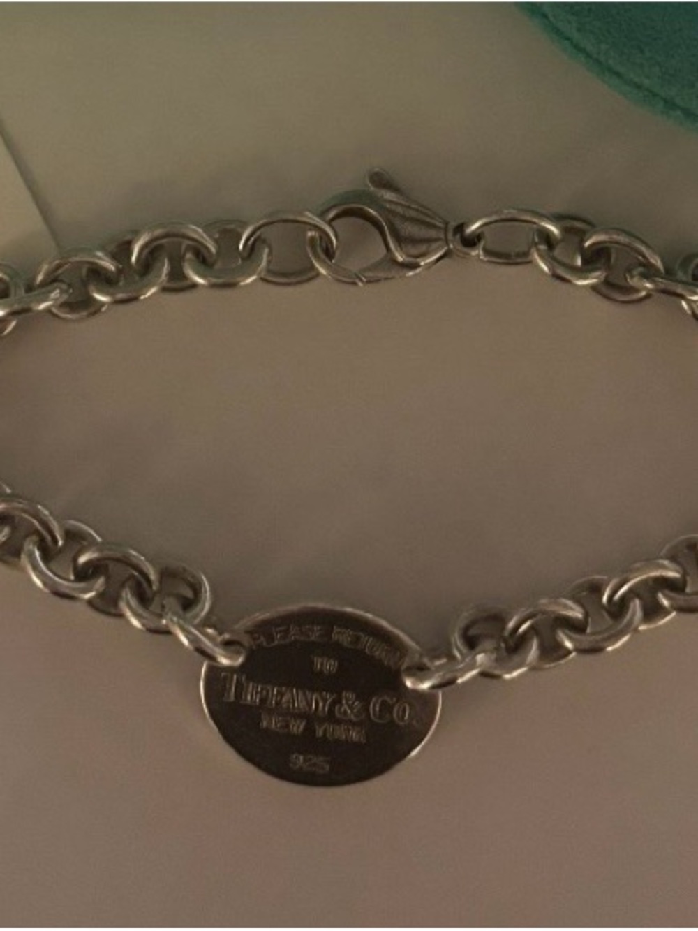 Tiffany & Co. Silver Chain Bracelet with Oval Tag and Blue Pouch